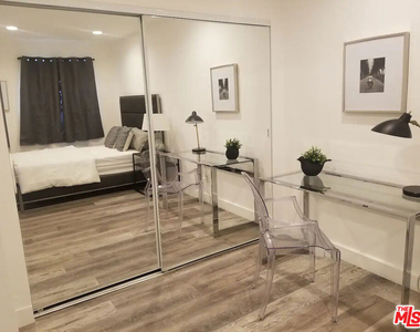335 E 65th Street - Photo Thumbnail 3