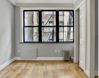 E 26TH ST - Photo Thumbnail 3
