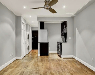 E 26TH ST - Photo Thumbnail 1