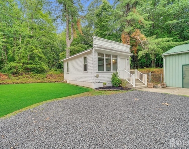 302 Schoolhouse Road - Photo Thumbnail 1