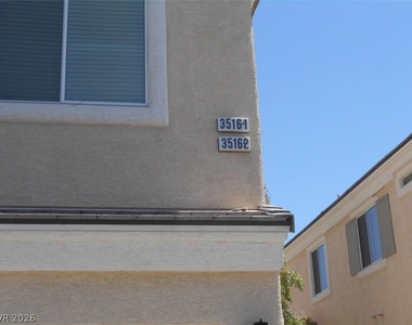 3516 Hazelnut Pine Place - Photo Thumbnail 2