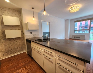 517 West 46 Street - Photo Thumbnail 2