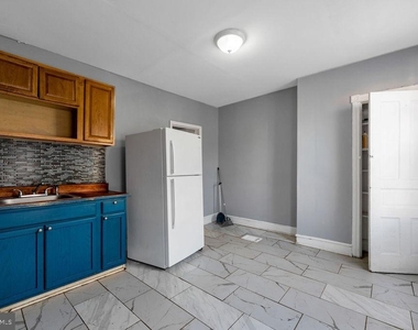 6164 Delancey Street - Photo Thumbnail 7