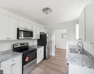 7005 Halleck Street - Photo Thumbnail 7
