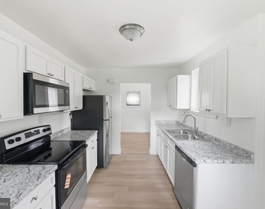 7005 Halleck Street - Photo Thumbnail 8