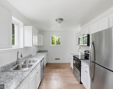 7005 Halleck Street - Photo Thumbnail 9