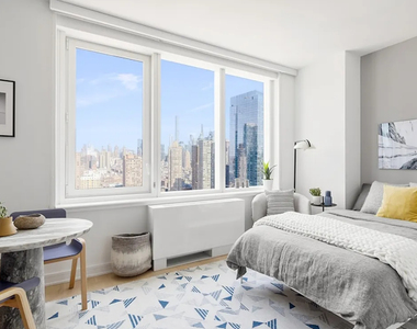 W 38th Street - Photo Thumbnail 1