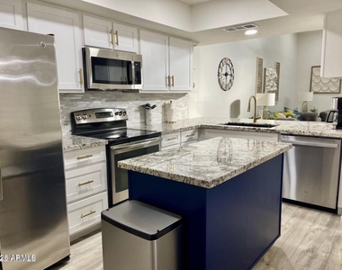 9040 E Winchcomb Drive - Photo Thumbnail 2