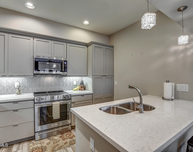 3935 E Rough Rider Road - Photo Thumbnail 6