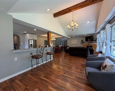 7024 Red Bud Lane - Photo Thumbnail 4