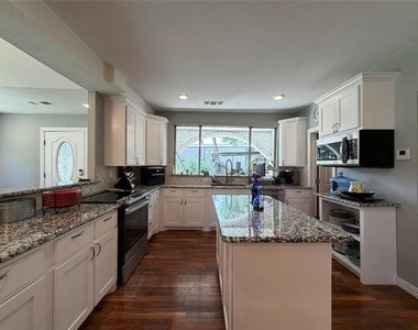 7024 Red Bud Lane - Photo Thumbnail 8