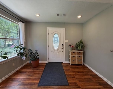 7024 Red Bud Lane - Photo Thumbnail 1