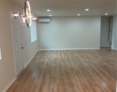 134 E M St - Photo Thumbnail 2