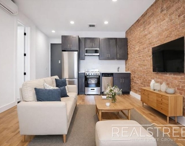 119 Ralph Ave - Photo Thumbnail 1