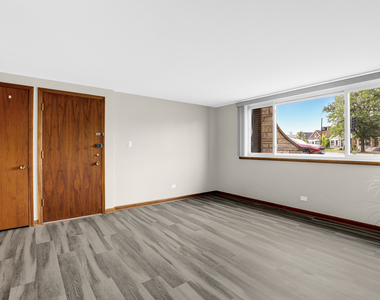 7101 W Foster Place - Photo Thumbnail 3