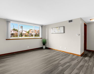 7101 W Foster Place - Photo Thumbnail 1