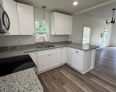 324 E Wilkins Street - Photo Thumbnail 2