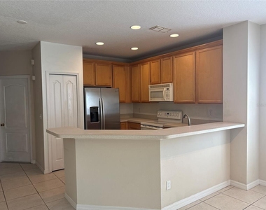 9428 Flowering Cottonwood Road - Photo Thumbnail 3
