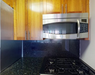 401 E 34th St - Photo Thumbnail 2