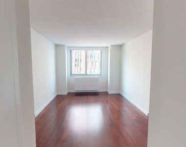 401 E 34th St - Photo Thumbnail 3