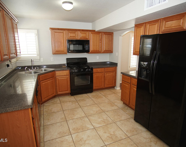 10932 Acoma Street - Photo Thumbnail 6