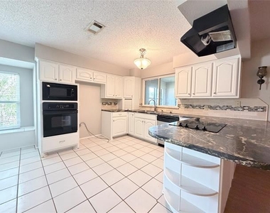 7832 Pebblebrook Drive - Photo Thumbnail 7