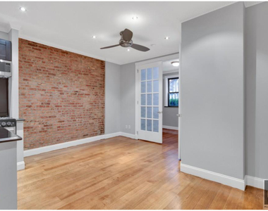 E 26th St. - Photo Thumbnail 2
