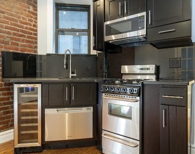 E 23rd St. - Photo Thumbnail 5