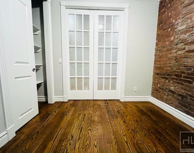 E 23rd St. - Photo Thumbnail 2
