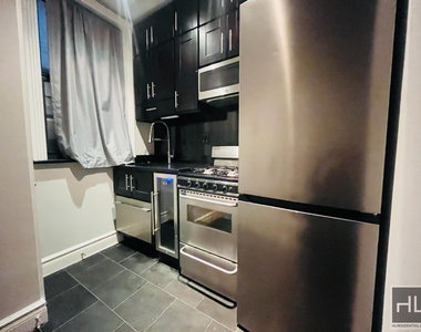 E 23rd St. - Photo Thumbnail 4