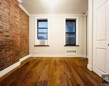 E 23rd St. - Photo Thumbnail 1