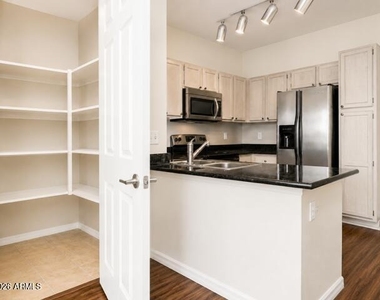 7009 E Acoma Drive - Photo Thumbnail 1