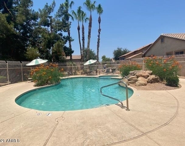8927 E Crescent Avenue - Photo Thumbnail 2