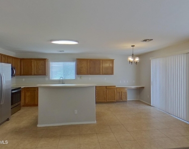 43714 W Cale Drive - Photo Thumbnail 2