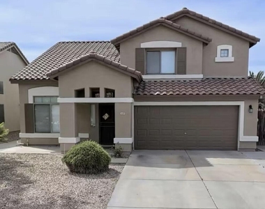 8609 W Vogel Avenue - Photo Thumbnail 1
