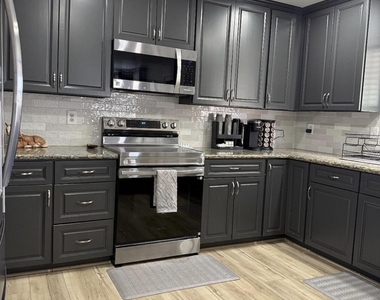 8609 W Vogel Avenue - Photo Thumbnail 6