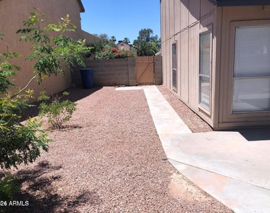 711 N Country Club Way - Photo Thumbnail 3