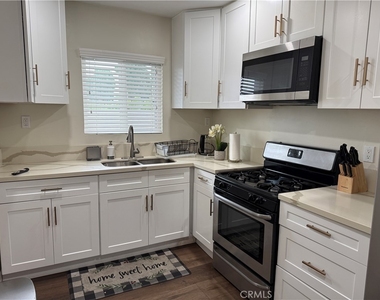 7348 Florence Ave - Photo Thumbnail 2