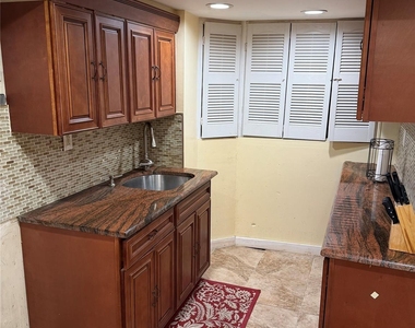 14730 Huxley Street - Photo Thumbnail 3