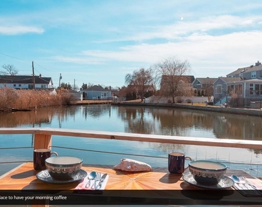 91 S Penataquit Avenue - Photo Thumbnail 24