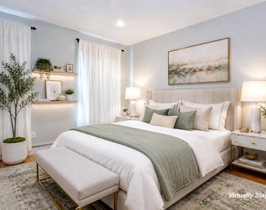 105 E 9th Street - Photo Thumbnail 6