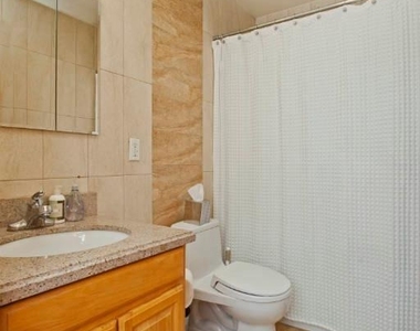 105 E 9th Street - Photo Thumbnail 11