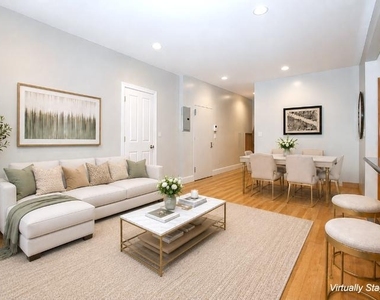 105 E 9th Street - Photo Thumbnail 1