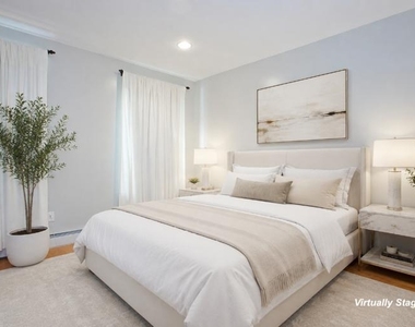 105 E 9th Street - Photo Thumbnail 7