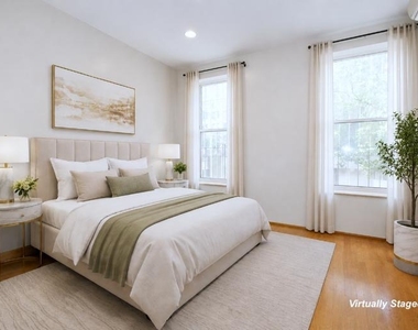 105 E 9th Street - Photo Thumbnail 4