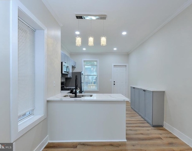 420 E 28th Street - Photo Thumbnail 7