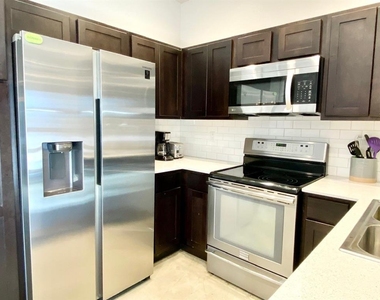 1300 E 3rd St - Photo Thumbnail 5