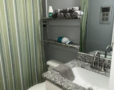 10902 Segrest Drive - Photo Thumbnail 3