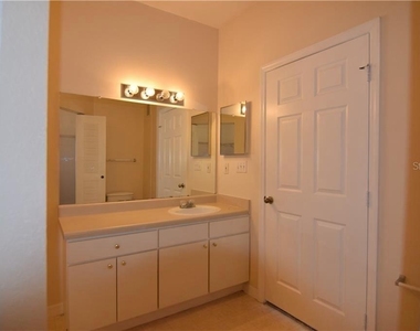 9640 Lake Chase Island Way - Photo Thumbnail 5