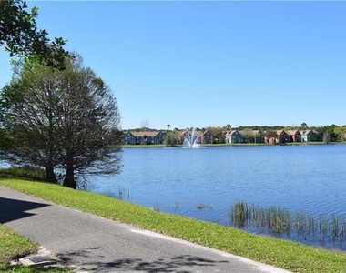 9640 Lake Chase Island Way - Photo Thumbnail 3